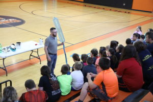 Jason Lindsey, "Mr. Science," presents to students