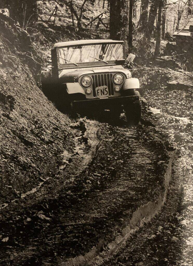 Connie in her red jeep "Devon" on her way to a home visit. 